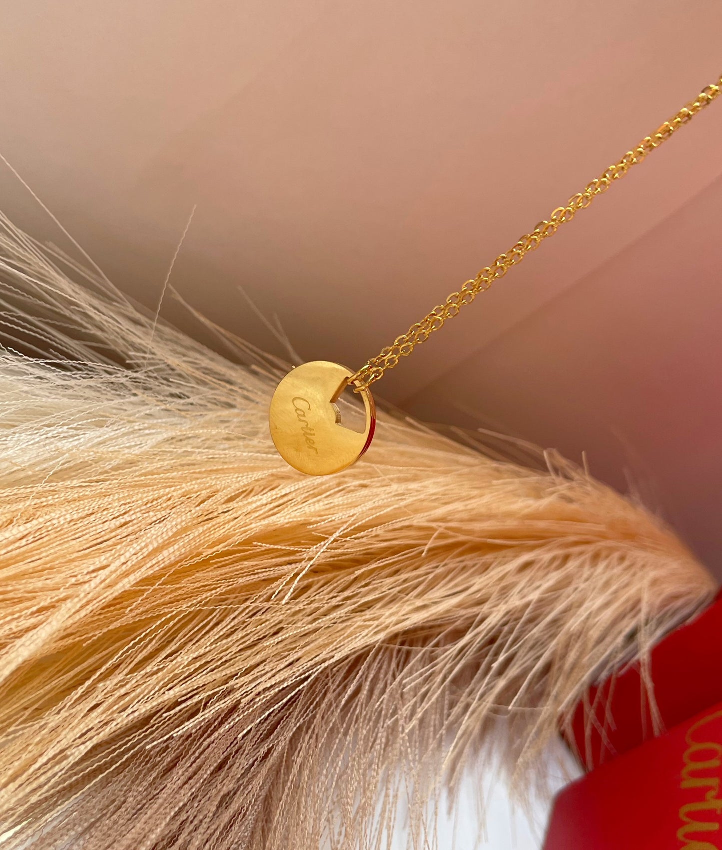 Collier Cartier Amulette doré