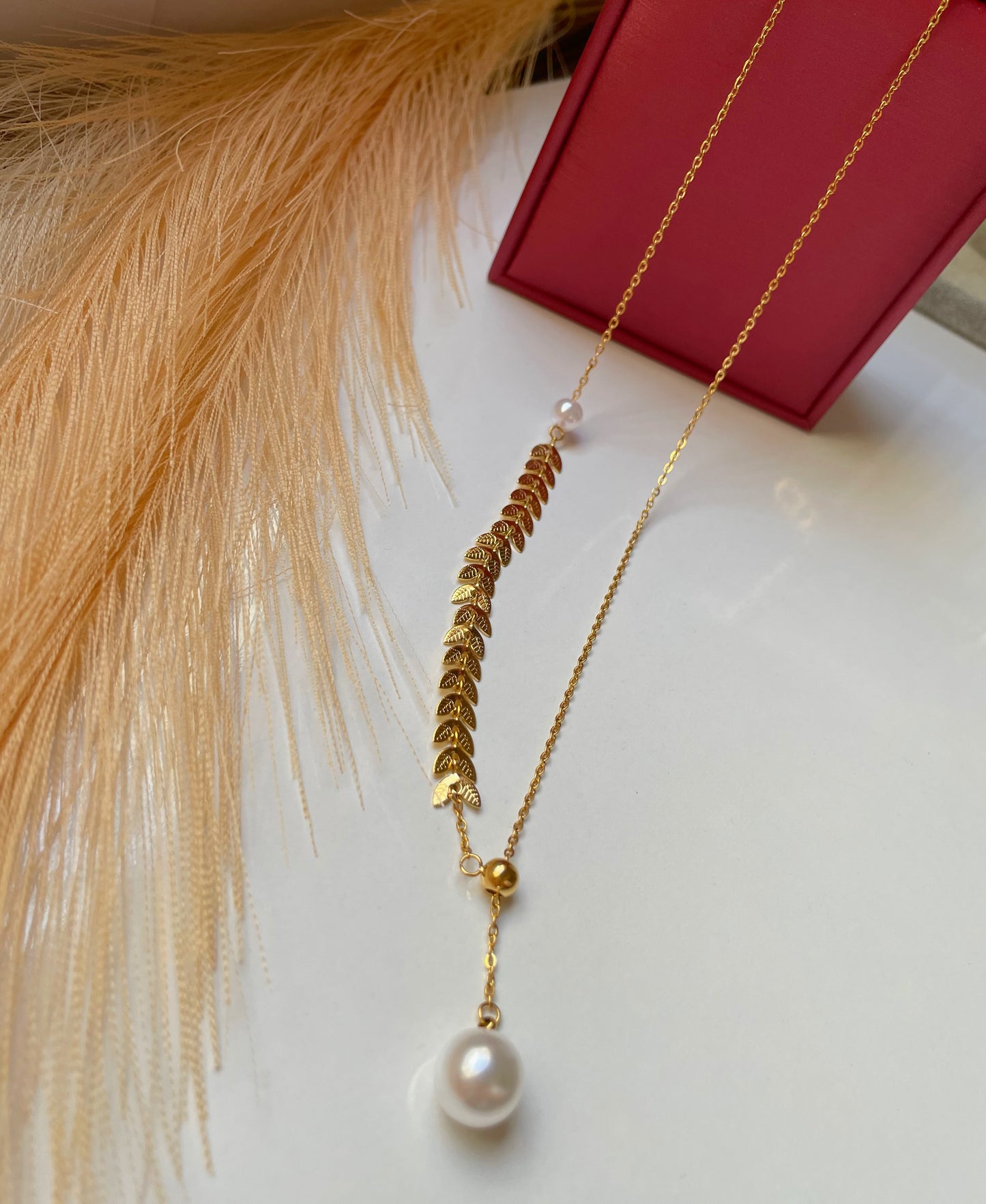 Collier perle doré