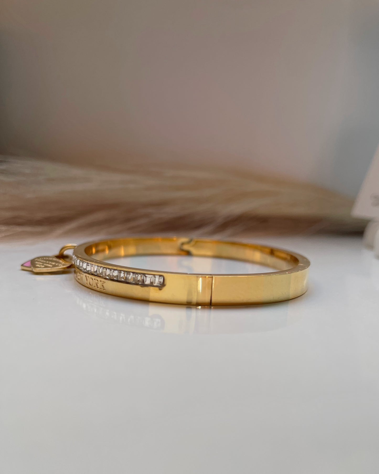 Bracelet Tiffany & Co doré avec coeurs