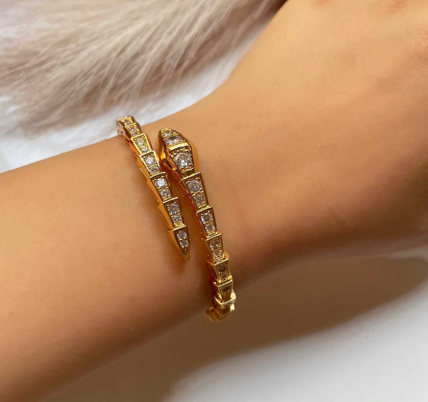 Bracelet Bvlgari serpenté doré