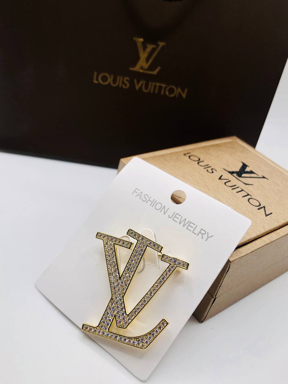 Broche Louis Vuitton Pour famme
