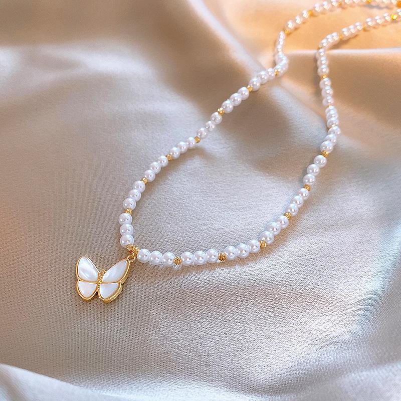 Collier papillon avec Perles