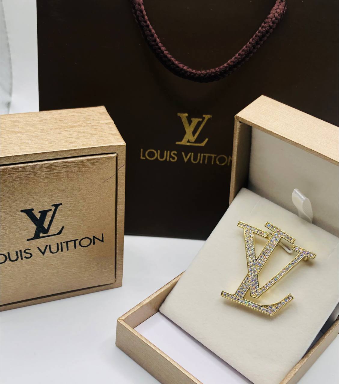 Broche Louis Vuitton Pour famme