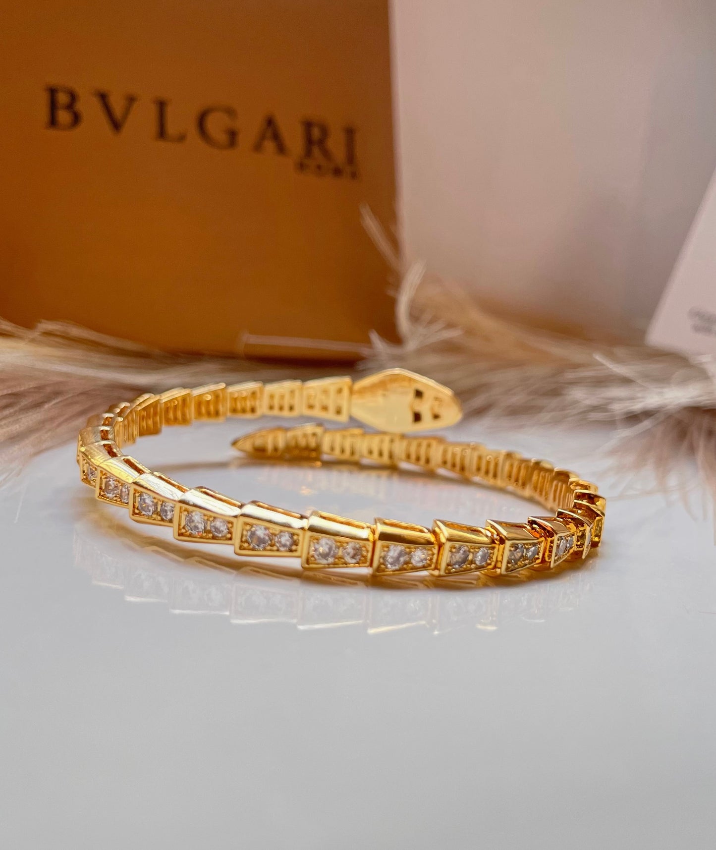 Bracelet Bvlgari serpenté doré
