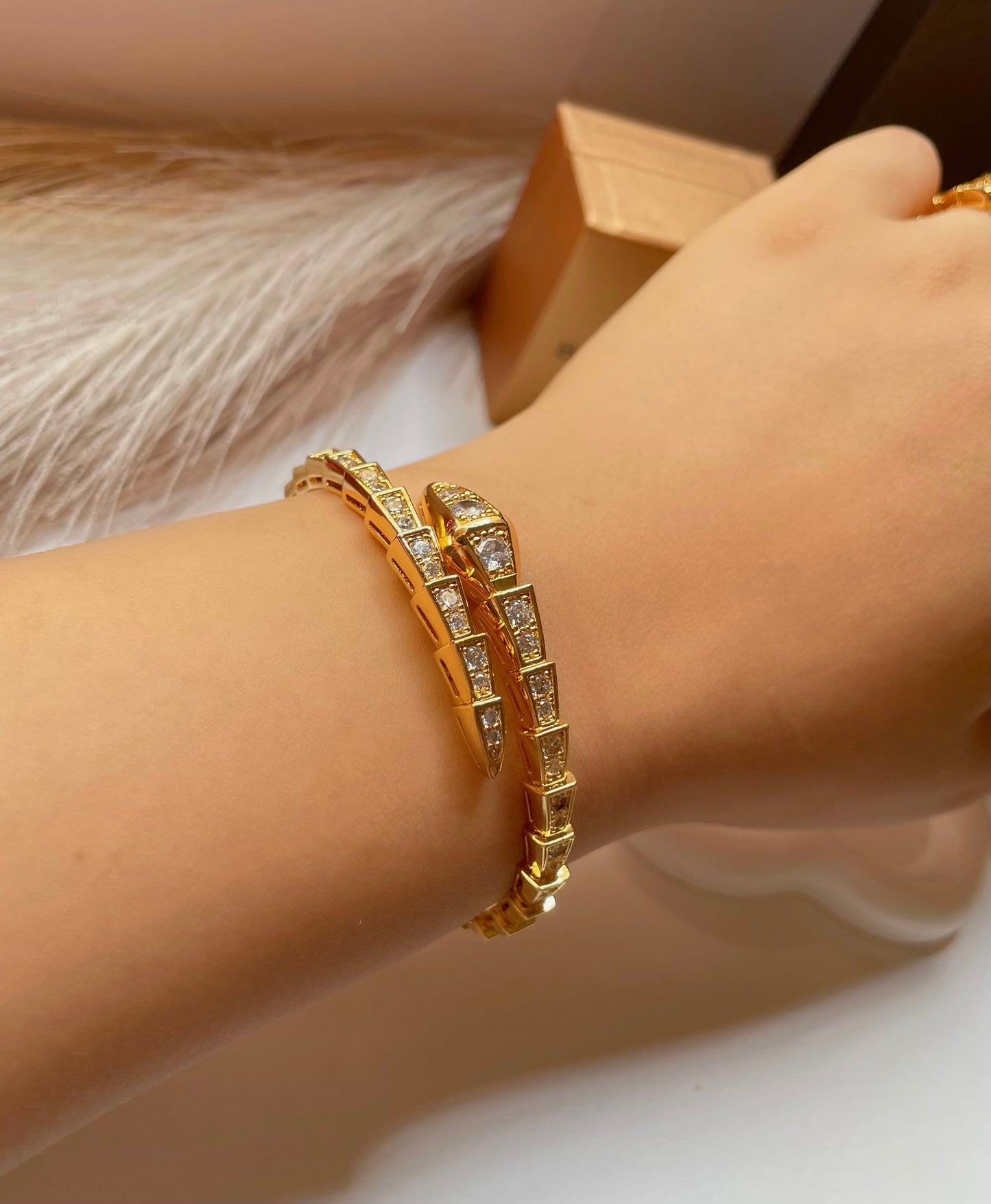 Bracelet Bvlgari serpenté doré