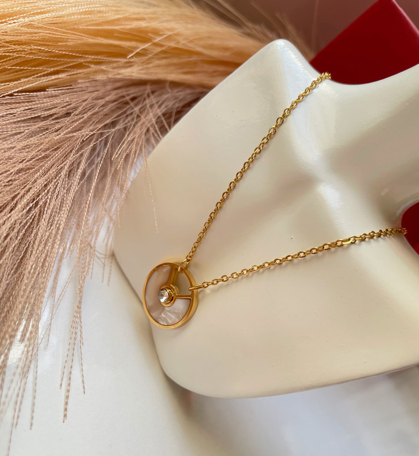 Collier Cartier Amulette doré