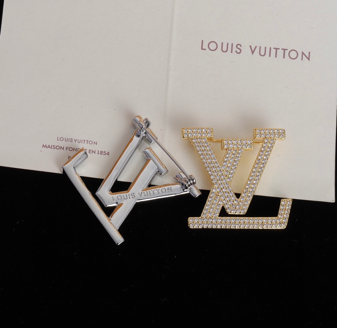 Broche Louis Vuitton avec strass