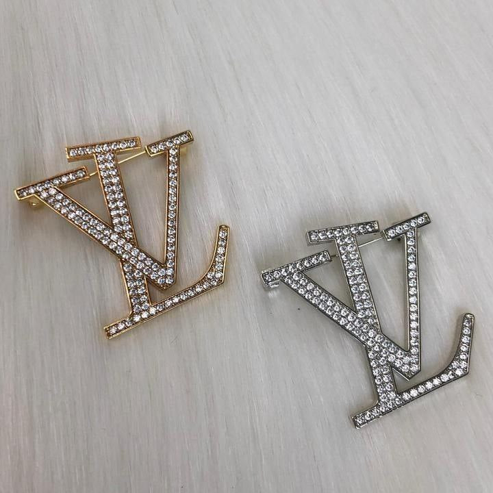 Broche Louis Vuitton avec strass