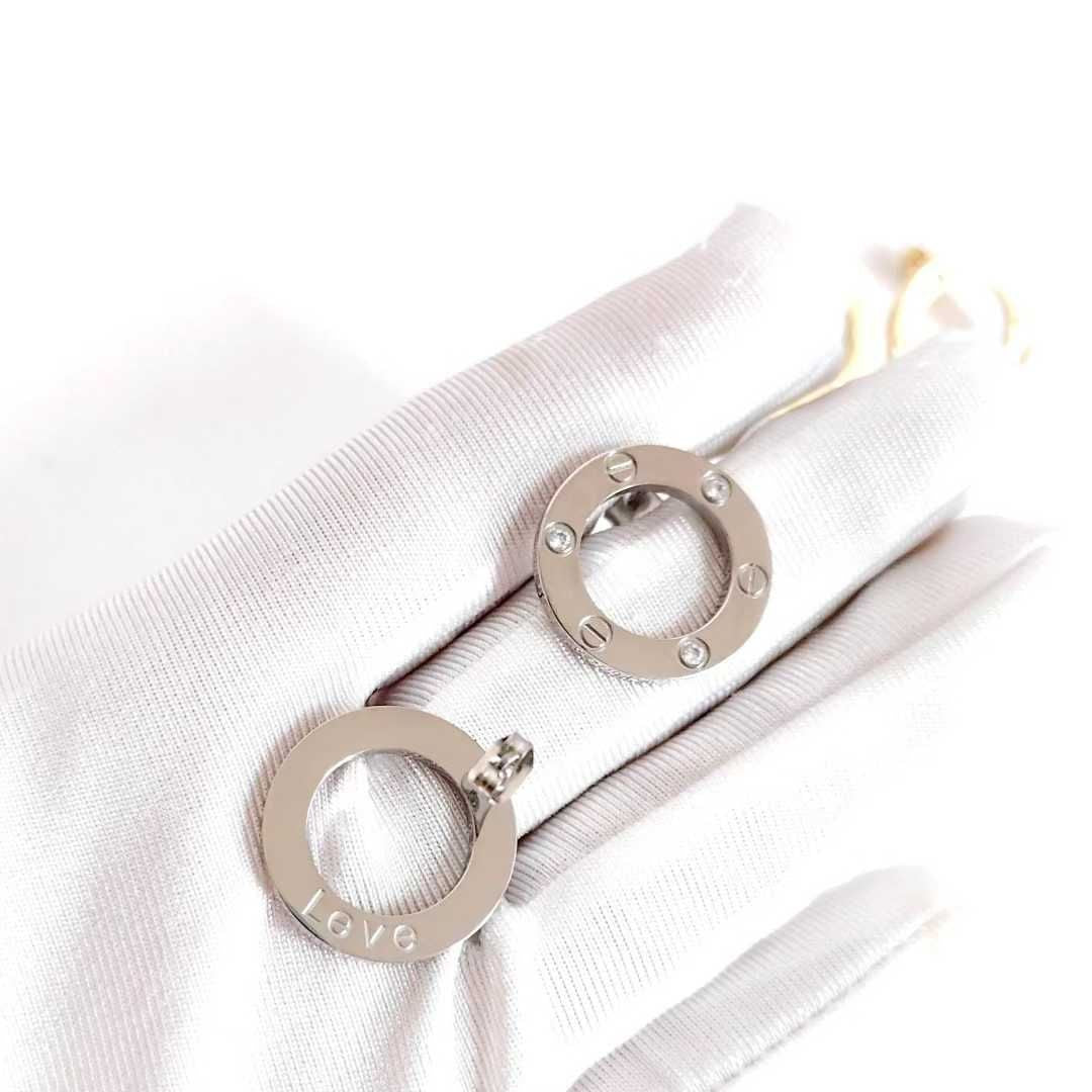 Boucles d’oreilles Cartier løve argenté