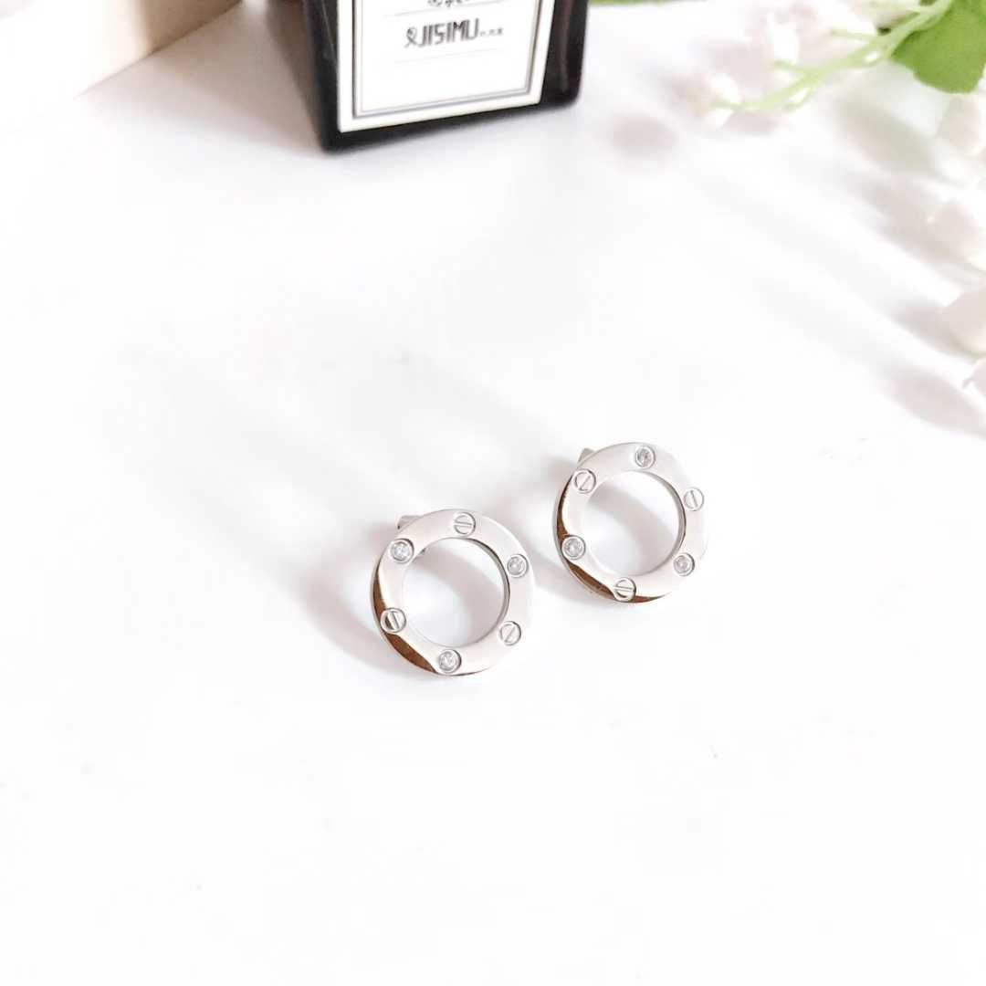Boucles d’oreilles Cartier løve argenté