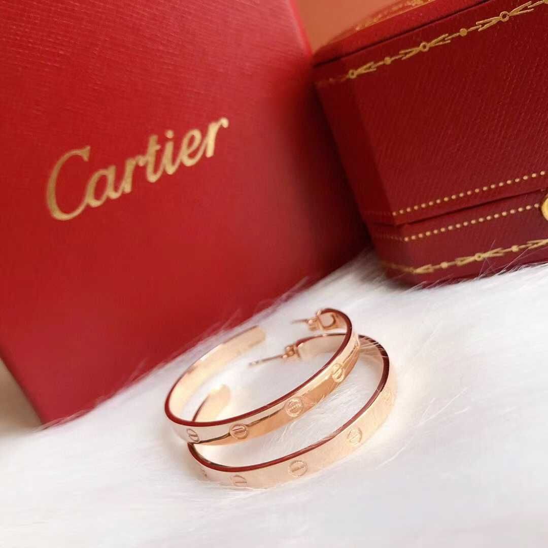 Boucles d’oreilles Cartier løve
