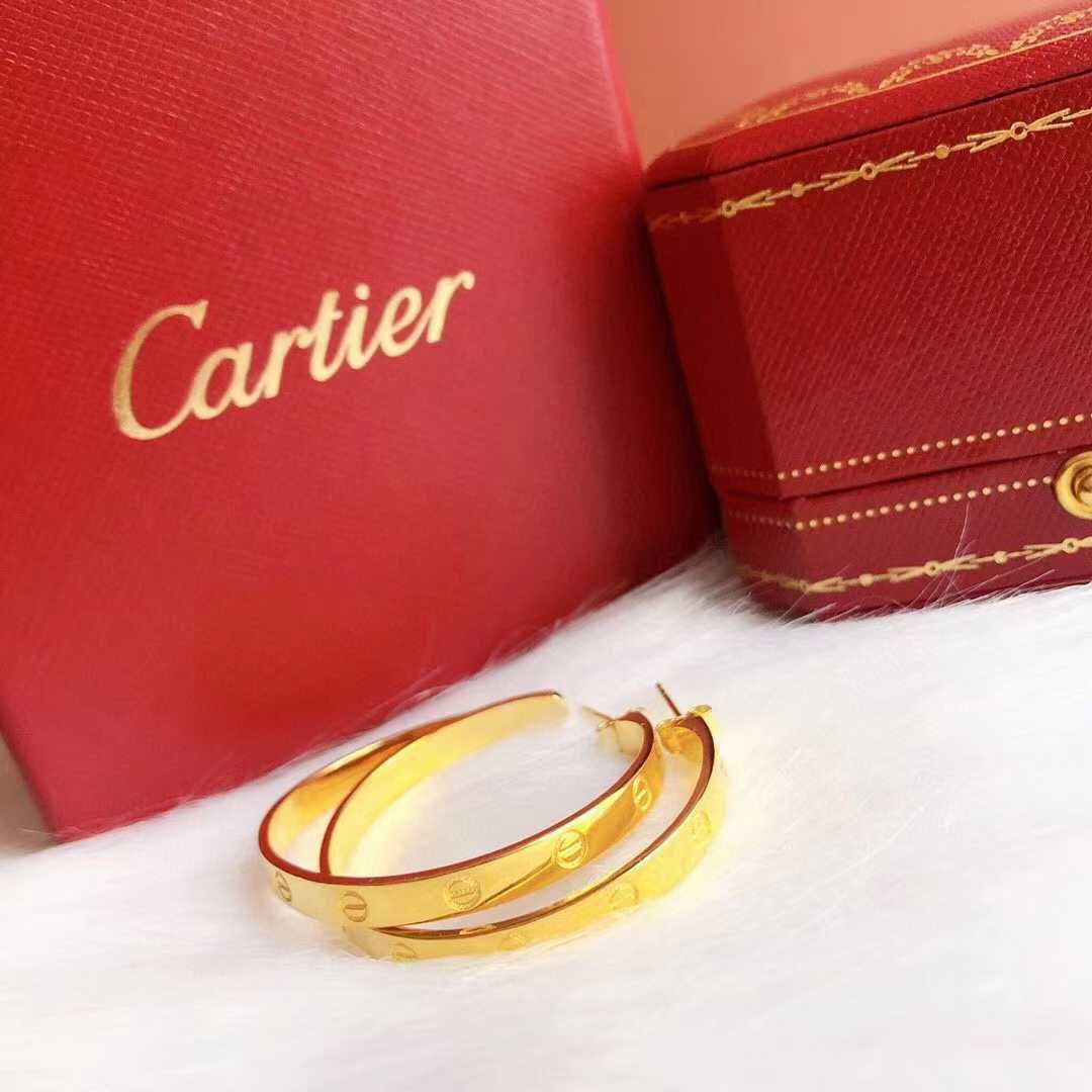 Boucles d’oreilles Cartier løve