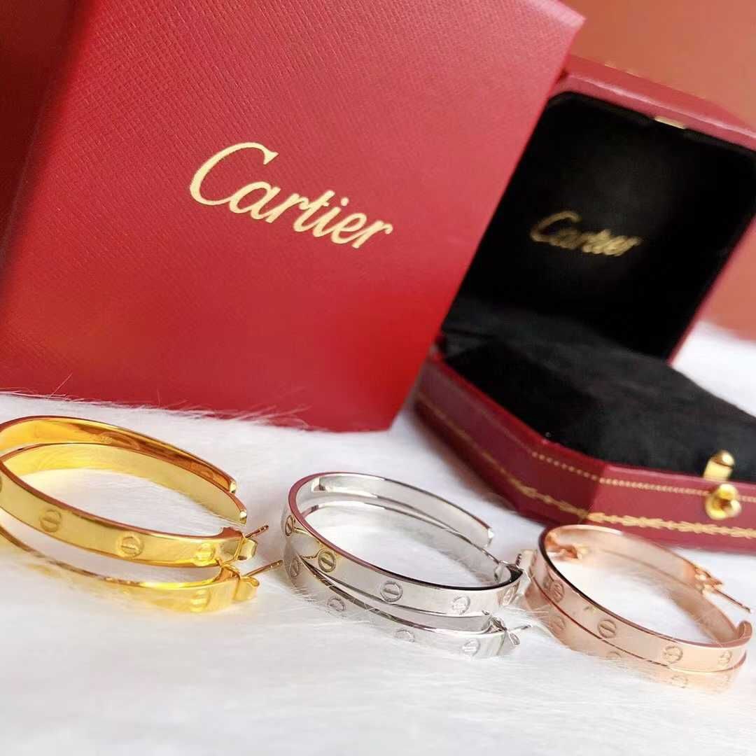 Boucles d’oreilles Cartier løve