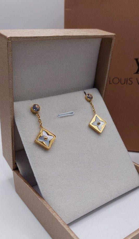Boucles d’oreilles Louis Vuitton doré