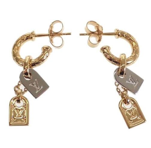 Boucles d’oreilles Louis Vuitton doré avec argenté