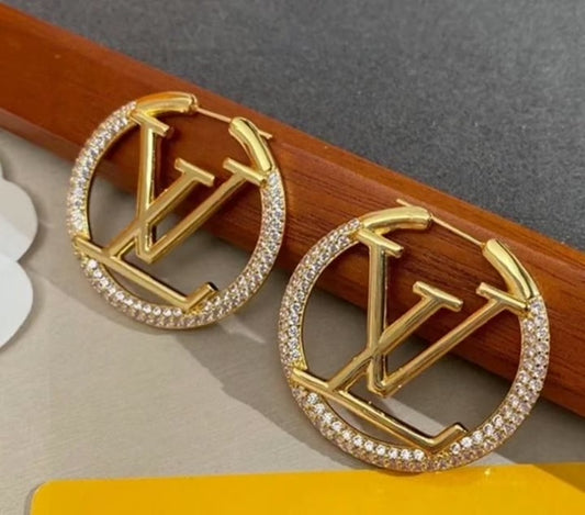 Boucles d’oreilles Louis Vuitton avec strass
