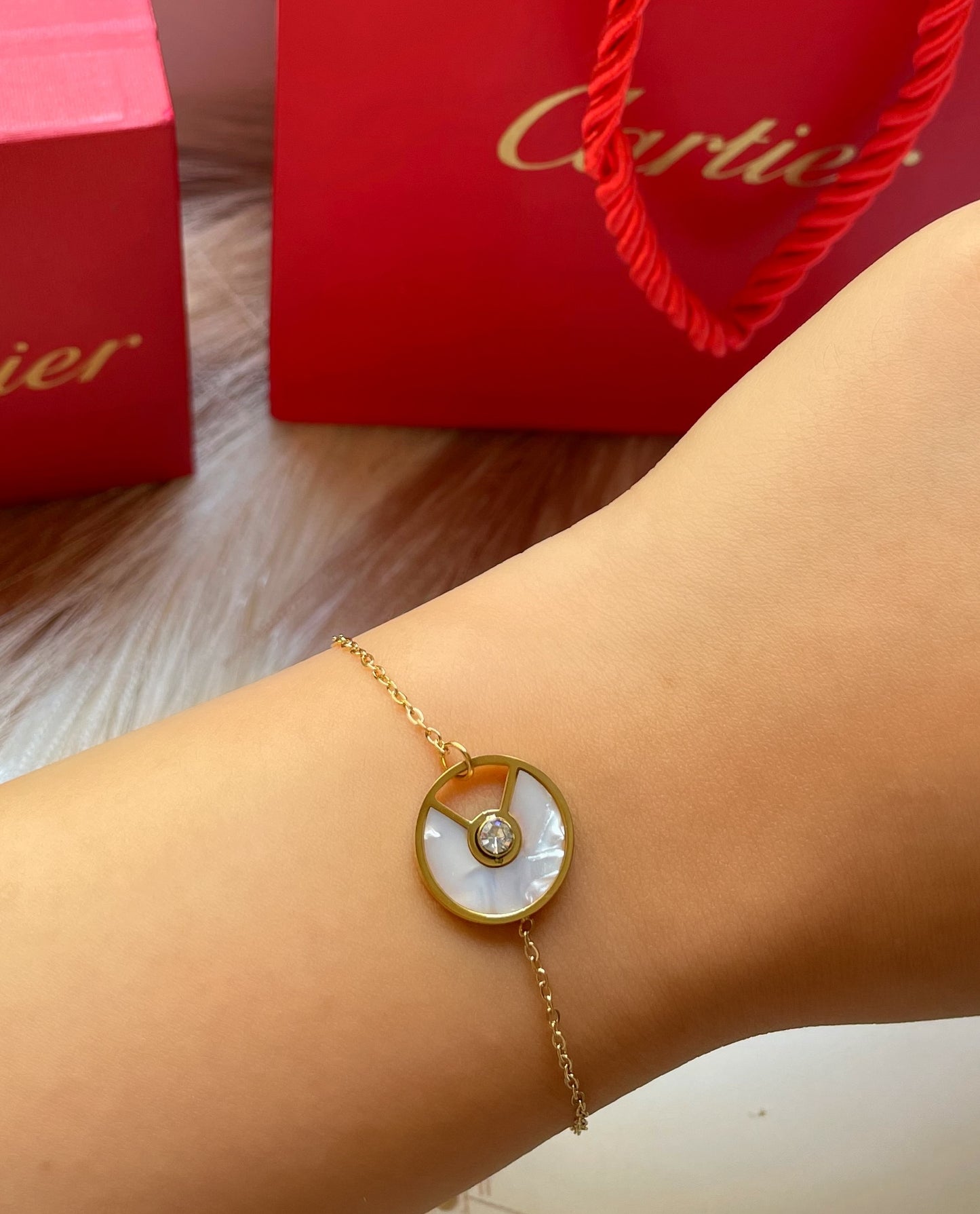 Gourmette Cartier Amulette doré