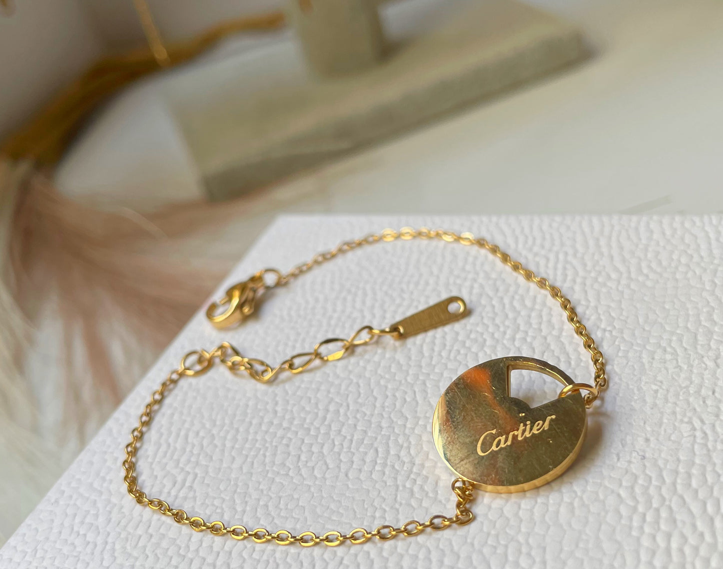 Gourmette Cartier Amulette doré