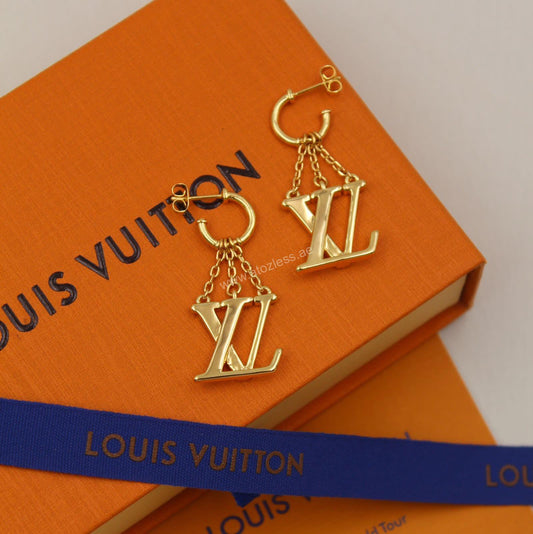 Boucles d’oreilles Louis Vuitton doré