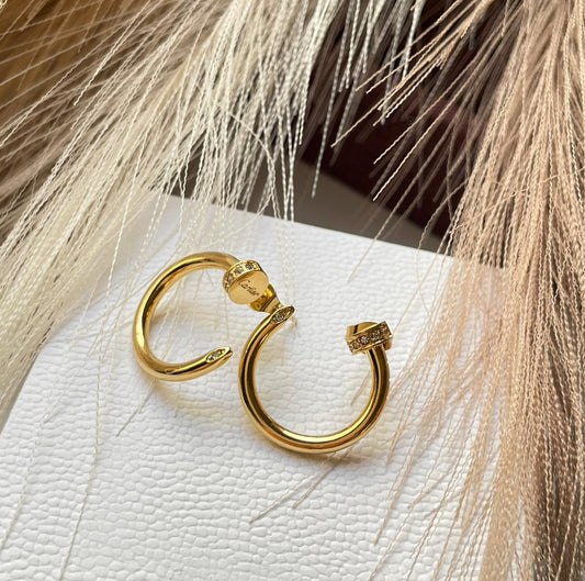 Boucles d'oreilles Cartier clou avec strass